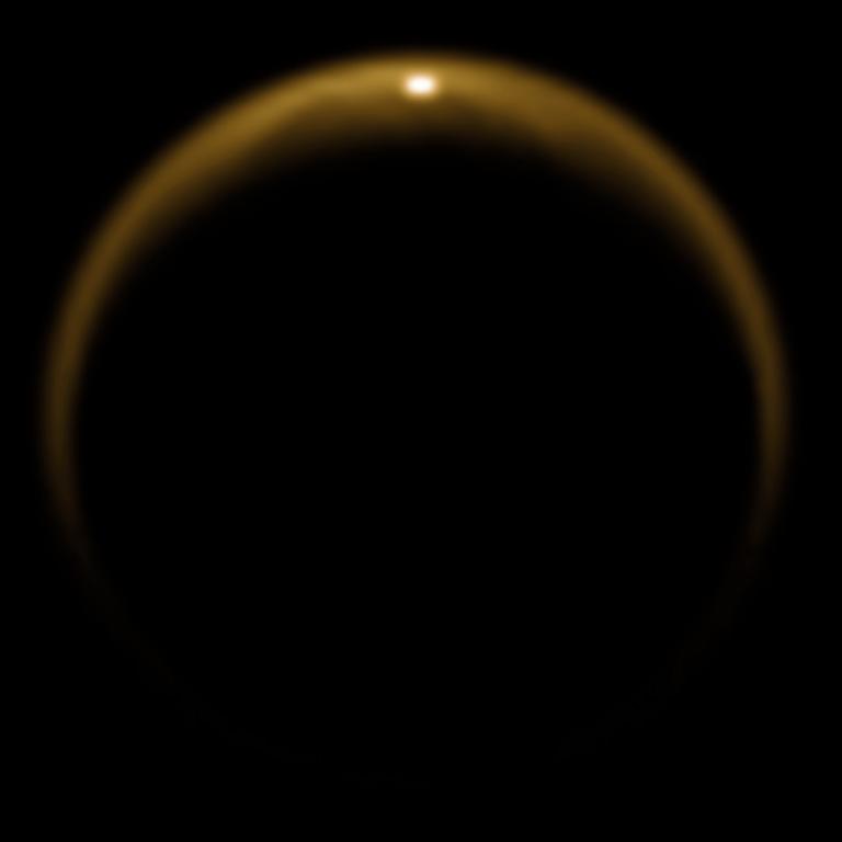Sunlight reflection off the seas and lakes of Titan&#39;s North Pole.