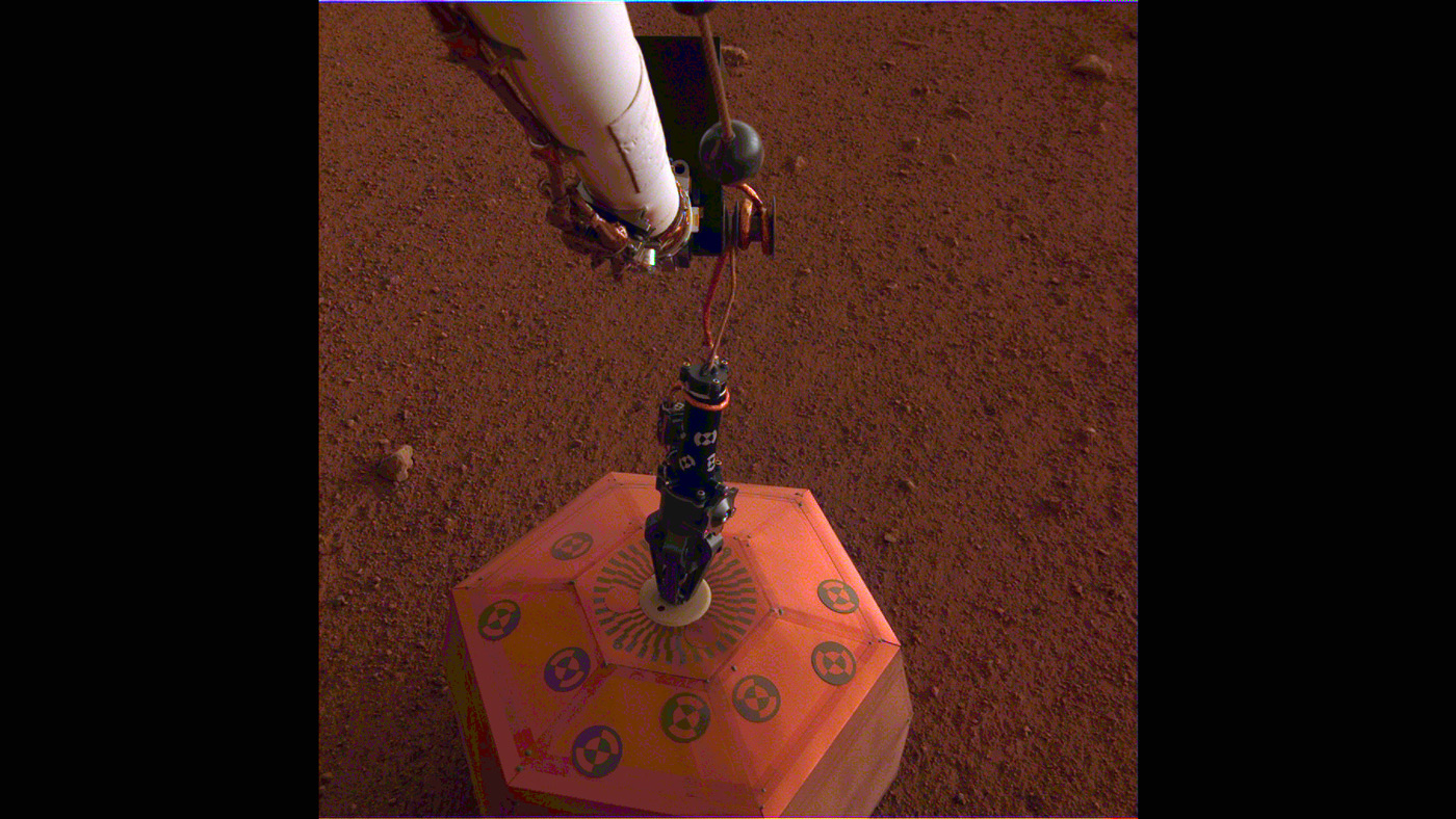 Photo taken by NASA's InSight lander placing its seismometer on Mars