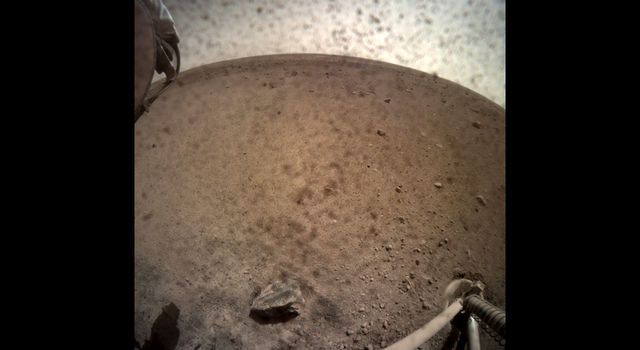 NASA's InSight spacecraft popped the lens cover off its Instrument Context Camera (ICC) on Nov. 30, 2018