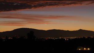 'Doug Groenhoff caught the November 13, 2017 conjunction of Venus and Jupiter, over the Rincon Mountains from far northwest Tucson, Arizona. "While dawn was cracking. Soon lost in clouds.”'